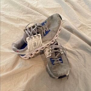 On Running Athletic Shoes in Gray and Blue